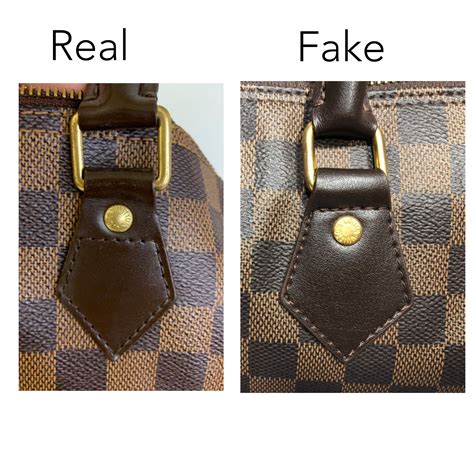 how to spot a fake louis vuitton duffle bag|how to tell if a louis vuitton bag is real.